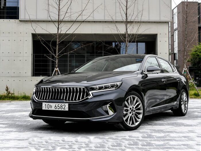 KIA K7 2 поколения рестайлинг